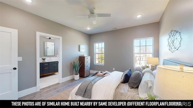 3229 Portis Ave, Saint Louis, MO 63116 - bedroom featuring light wood-style flooring, baseboards, ensuite bath, recessed lighting, and ceiling fan