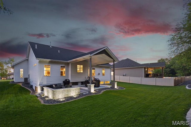 409 Briar Creek Rd, Troy, IL 62294 - back of property at dusk with a patio