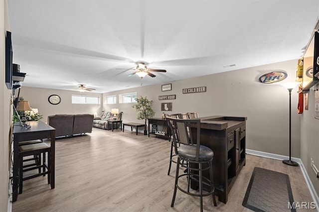 409 Briar Creek Rd, Troy, IL 62294 - dining space with ceiling fan, light wood-type flooring, and baseboards