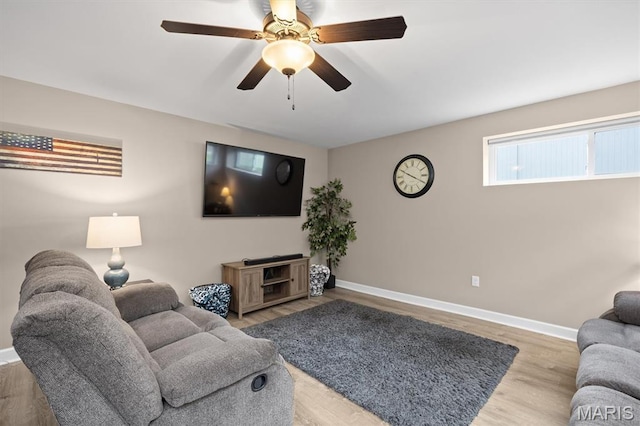 409 Briar Creek Rd, Troy, IL 62294 - living room with wood finished floors, baseboards, and a ceiling fan