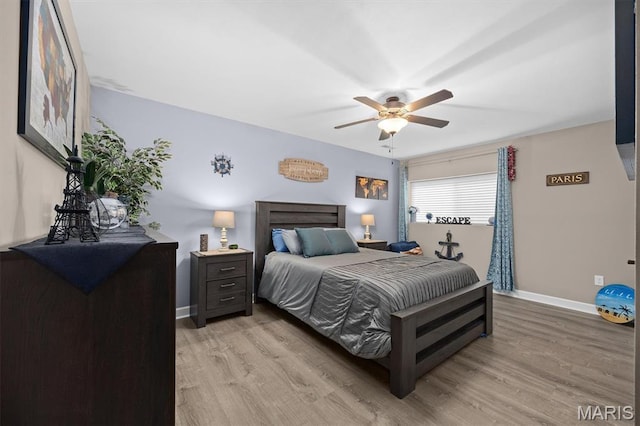 409 Briar Creek Rd, Troy, IL 62294 - bedroom with light wood-style floors, baseboards, and ceiling fan