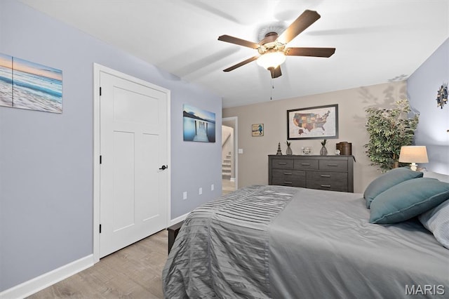 409 Briar Creek Rd, Troy, IL 62294 - bedroom featuring wood finished floors, baseboards, and ceiling fan