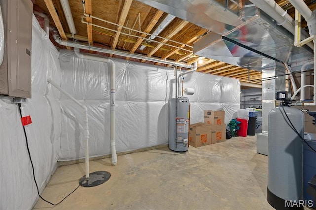 409 Briar Creek Rd, Troy, IL 62294 - unfinished below grade area featuring gas water heater, electric panel, and a water softener system