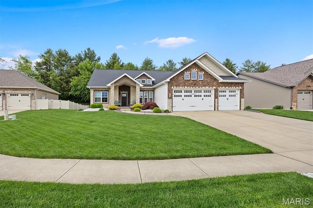 409 Briar Creek Rd, Troy, IL 62294 - craftsman inspired home with concrete driveway, an attached garage, brick siding, and stone siding