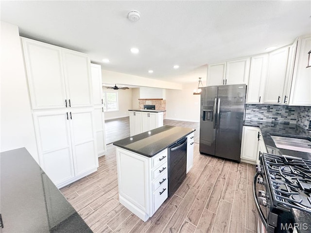 906 E Pace St, Salem, MO 65560 - kitchen featuring fridge with ice dispenser, light wood finished floors, a kitchen island, dishwasher, and recessed lighting