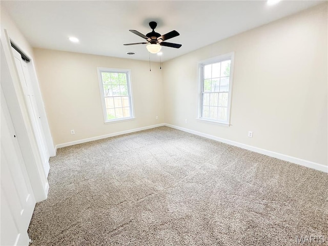 906 E Pace St, Salem, MO 65560 - carpeted spare room with baseboards, recessed lighting, and a ceiling fan