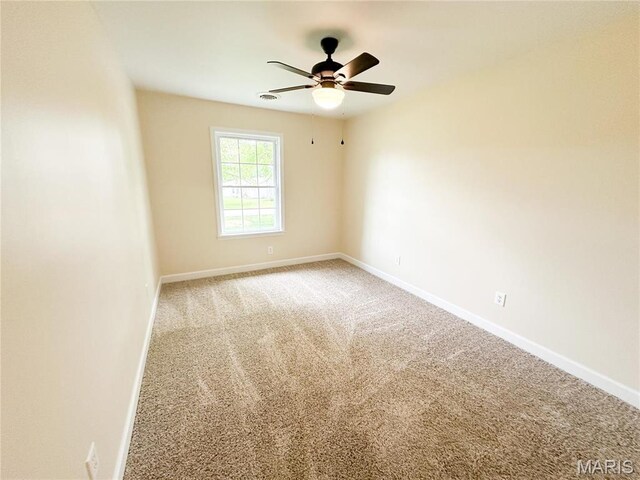 906 E Pace St, Salem, MO 65560 - carpeted empty room with baseboards and a ceiling fan