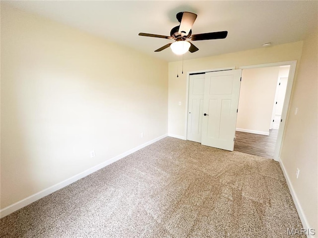 906 E Pace St, Salem, MO 65560 - unfurnished bedroom with carpet, baseboards, a closet, and ceiling fan