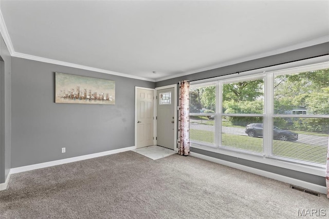 1095 Rogers Ln, Florissant, MO 63033 - carpeted entrance foyer featuring ornamental molding and baseboards