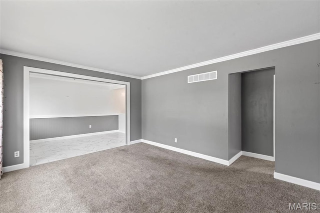 1095 Rogers Ln, Florissant, MO 63033 - unfurnished bedroom featuring crown molding, baseboards, and carpet floors