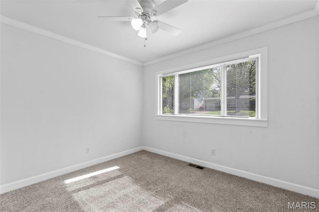 1095 Rogers Ln, Florissant, MO 63033 - carpeted empty room with ornamental molding, baseboards, and a ceiling fan