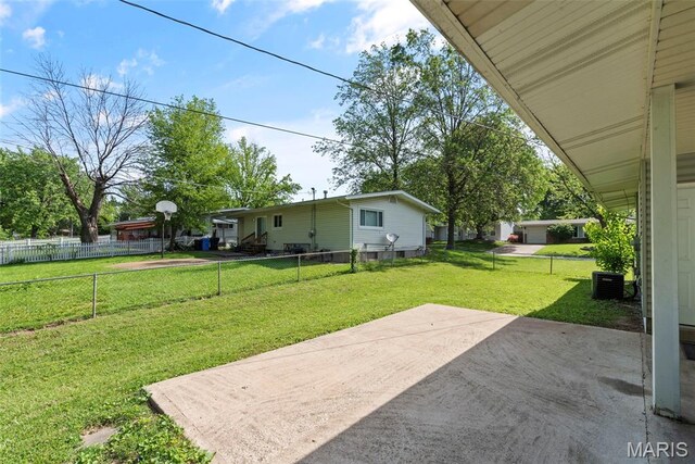 1095 Rogers Ln, Florissant, MO 63033 - view of yard with a patio area and cooling unit