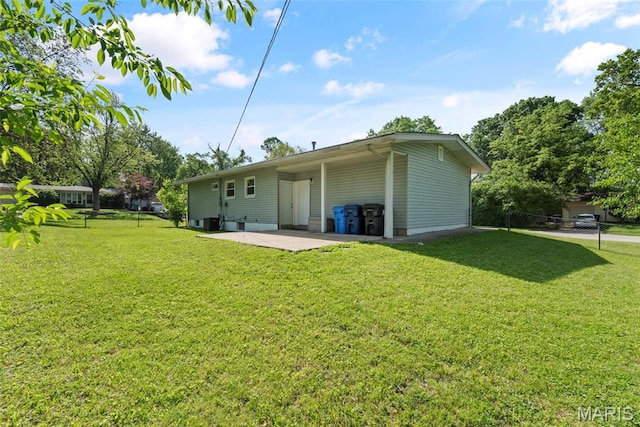 1095 Rogers Ln, Florissant, MO 63033 - rear view of house with a patio