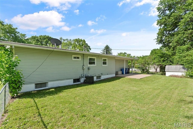 1095 Rogers Ln, Florissant, MO 63033 - rear view of property with cooling unit and a patio