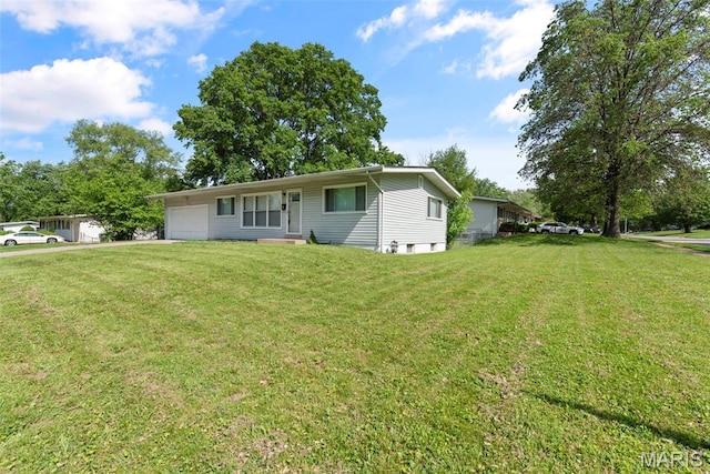 1095 Rogers Ln, Florissant, MO 63033 - view of front of property featuring a garage and a front yard