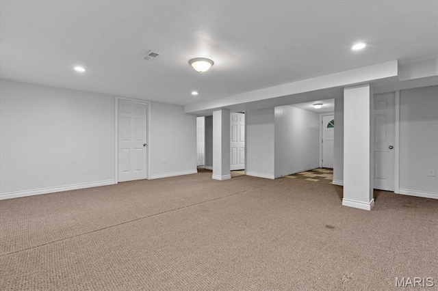 finished below grade area featuring recessed lighting, carpet, and baseboards