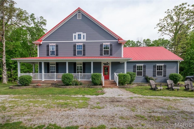 7877 Sylvan Pl, Dittmer, MO 63023 - farmhouse-style home with a porch and metal roof