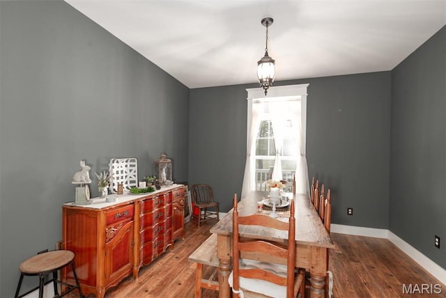 7877 Sylvan Pl, Dittmer, MO 63023 - dining space with wood finished floors and baseboards