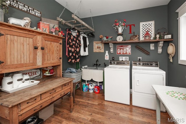 7877 Sylvan Pl, Dittmer, MO 63023 - washroom featuring separate washer and dryer and wood finished floors