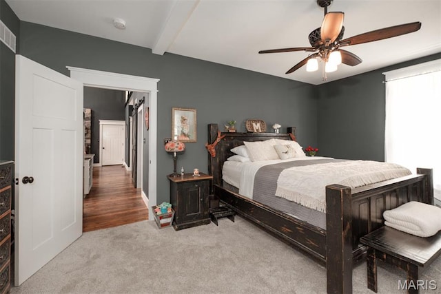 7877 Sylvan Pl, Dittmer, MO 63023 - bedroom featuring carpet flooring, beamed ceiling, and a ceiling fan