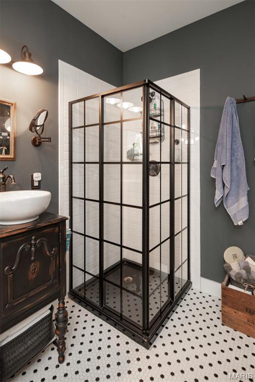 7877 Sylvan Pl, Dittmer, MO 63023 - bathroom with a stall shower and vanity