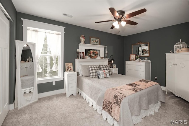 7877 Sylvan Pl, Dittmer, MO 63023 - bedroom featuring multiple windows, carpet flooring, and ceiling fan