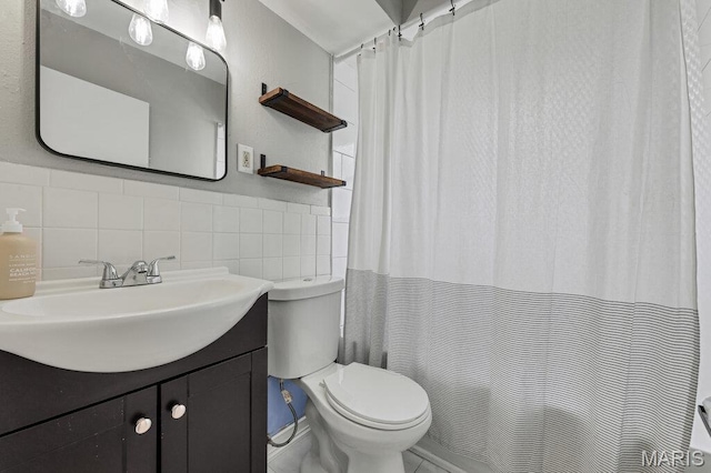 full bathroom featuring toilet, tile walls, vanity, and a shower with curtain