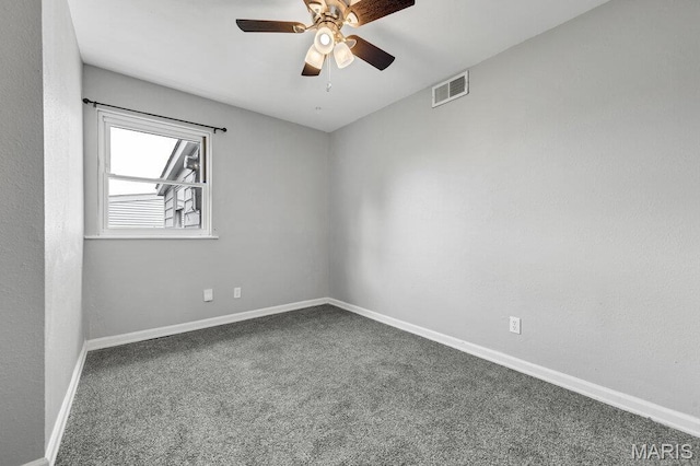 unfurnished room featuring carpet flooring, ceiling fan, and baseboards