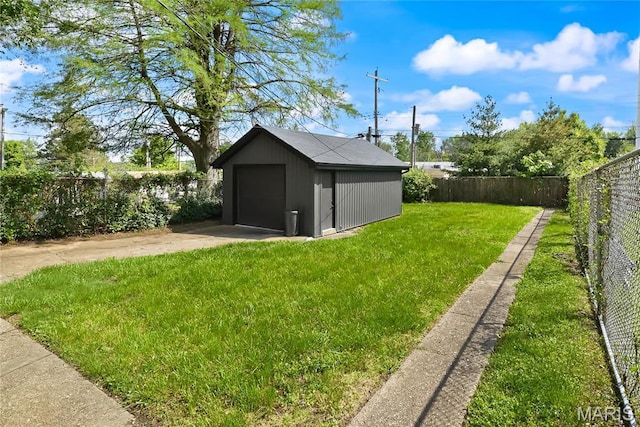 7544 Melrose Ave, University City, MO 63130 - view of yard with an outdoor structure and a garage