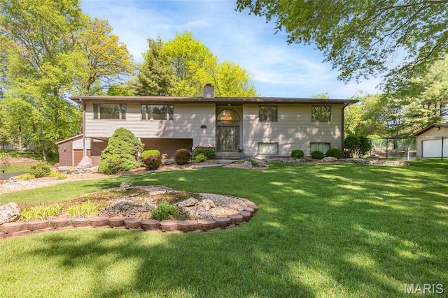 1934 Brigantine Cir, Worden, IL 62097 - split foyer home with a front lawn and a chimney