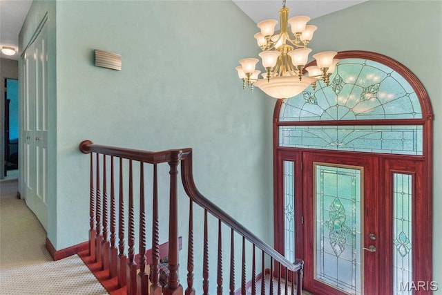 1934 Brigantine Cir, Worden, IL 62097 - carpeted foyer featuring a chandelier and baseboards