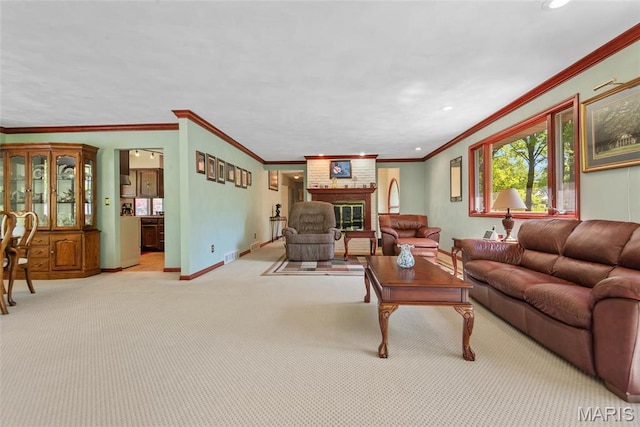 1934 Brigantine Cir, Worden, IL 62097 - living area featuring carpet, crown molding, a brick fireplace, baseboards, and recessed lighting