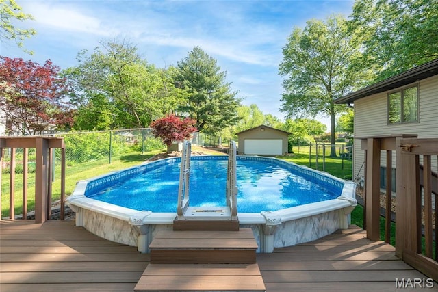 1934 Brigantine Cir, Worden, IL 62097 - view of swimming pool with a wooden deck and an outdoor structure