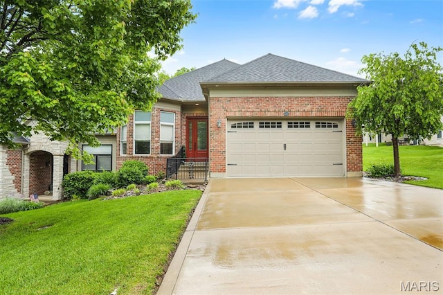 view of front of home with a front yard, concrete driveway, a garage, a shingled roof, and brick siding