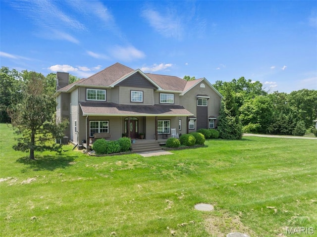 228 Bluegrass Ridge Rd, Saint Clair, MO 63077 - view of front of property featuring covered porch, a chimney, a front lawn, and cooling unit