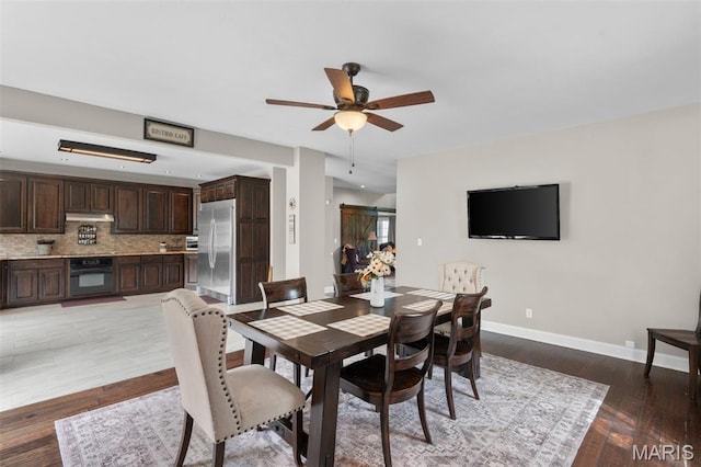 228 Bluegrass Ridge Rd, Saint Clair, MO 63077 - dining area with baseboards, ceiling fan, and light wood-style flooring