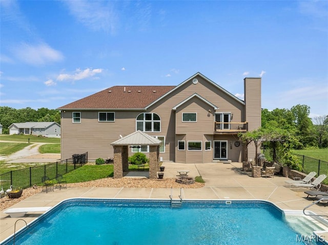 228 Bluegrass Ridge Rd, Saint Clair, MO 63077 - view of swimming pool featuring a patio area, fence, a gazebo, and a diving board