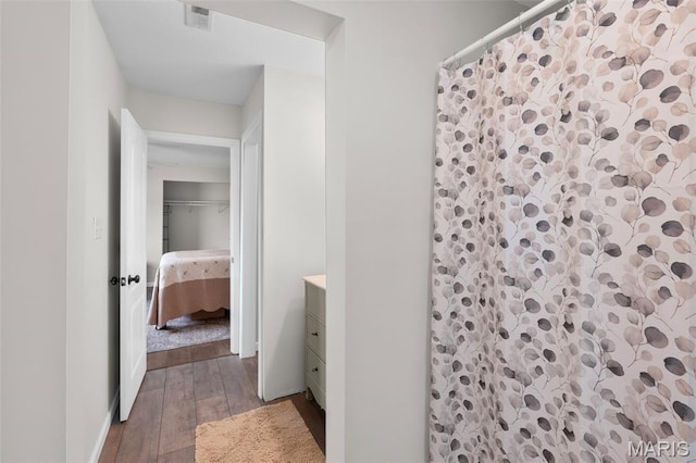 228 Bluegrass Ridge Rd, Saint Clair, MO 63077 - full bath featuring wood-type flooring and a shower with curtain