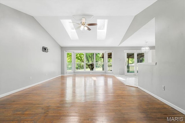 667 Workman Rd, Eureka, MO 63025 - spare room with a skylight, hardwood / wood-style flooring, baseboards, a ceiling fan, and high vaulted ceiling