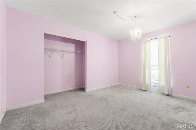 667 Workman Rd, Eureka, MO 63025 - unfurnished bedroom with carpet, a chandelier, and baseboards