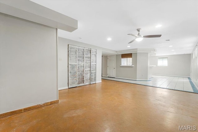 667 Workman Rd, Eureka, MO 63025 - unfurnished room featuring a ceiling fan, baseboards, recessed lighting, and finished concrete flooring