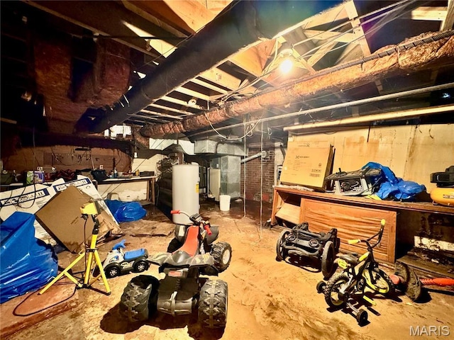 unfinished below grade area featuring gas water heater