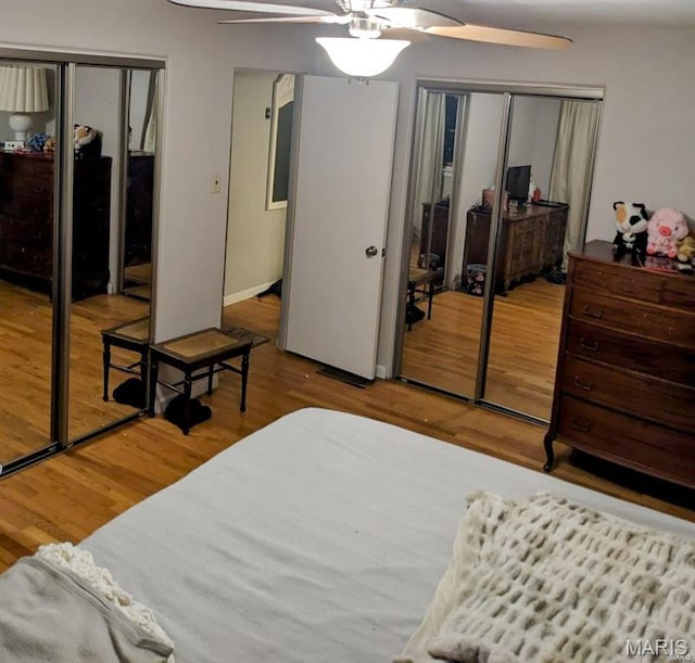 bedroom featuring wood finished floors and ceiling fan
