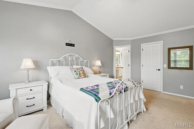 bedroom with light carpet, crown molding, vaulted ceiling, ensuite bath, and baseboards