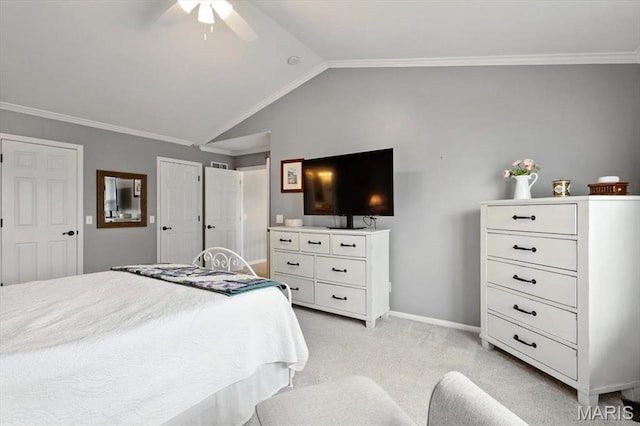 bedroom with crown molding, lofted ceiling, light colored carpet, baseboards, and ceiling fan