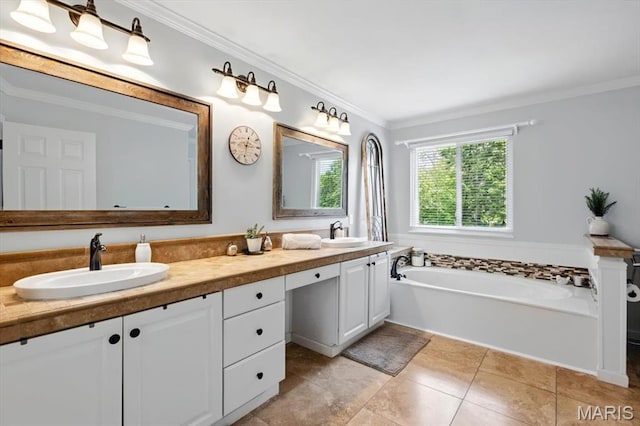 full bath featuring double vanity, a garden tub, crown molding, and tile patterned floors