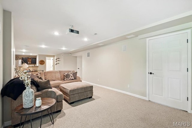living area with baseboards, carpet, and recessed lighting