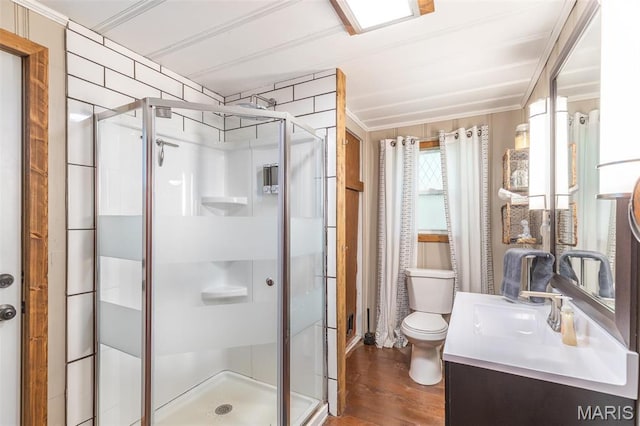 167 Ripley Co Rd Unit Y-3, Doniphan, MO 63935 - bathroom featuring a shower stall, ornamental molding, toilet, wood finished floors, and vanity