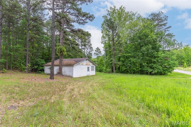 167 Ripley Co Rd Unit Y-3, Doniphan, MO 63935 - view of yard with an outdoor structure and a forest view
