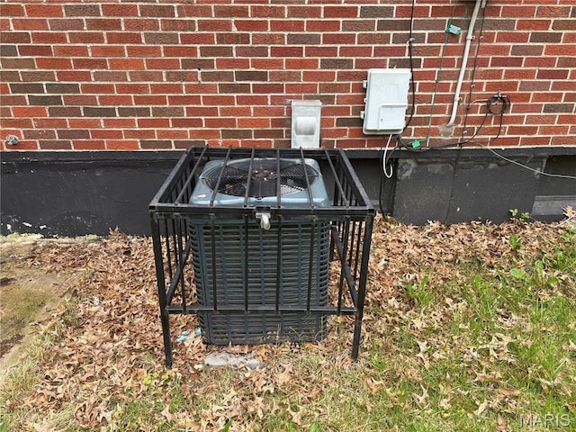 1749 Foley Dr, Saint Louis, MO 63136 - exterior view of cooling unit and brick siding